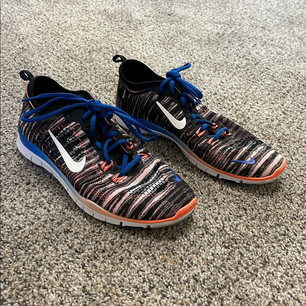 Nike Black and Orange Athletic Shoes with Blue Accents